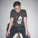 Person sitting on stool in Waldersten x Bum Society t-shirt original artwork Cry Baby color:ink