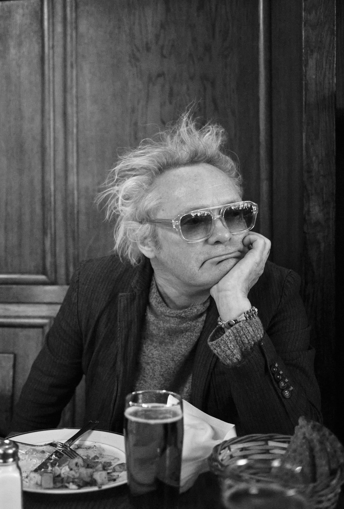 Claes Bondelid sitting at a table Pelikan Stockholm Too Old To Stop Bum Society