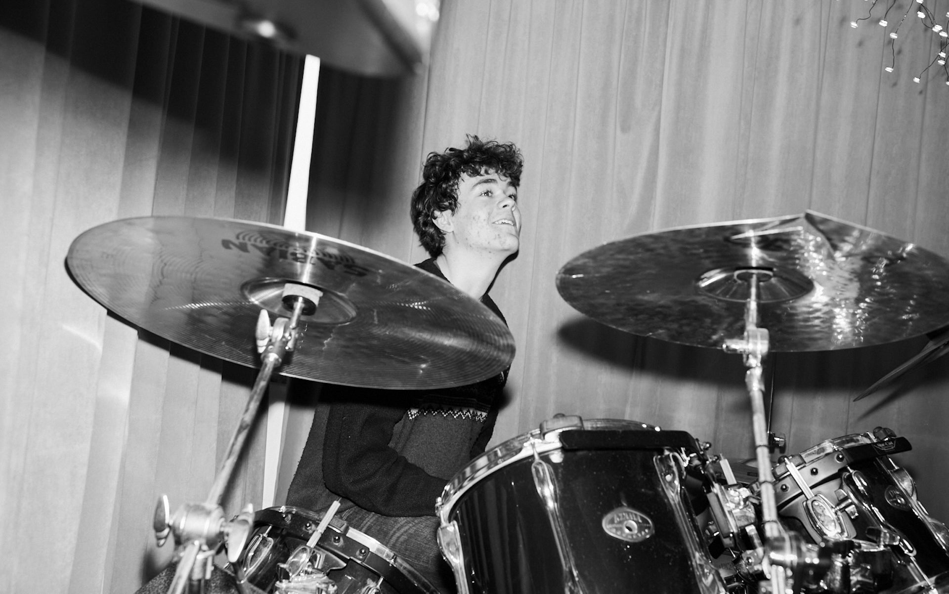 Alex on drums Diset rehearsal in basement studio