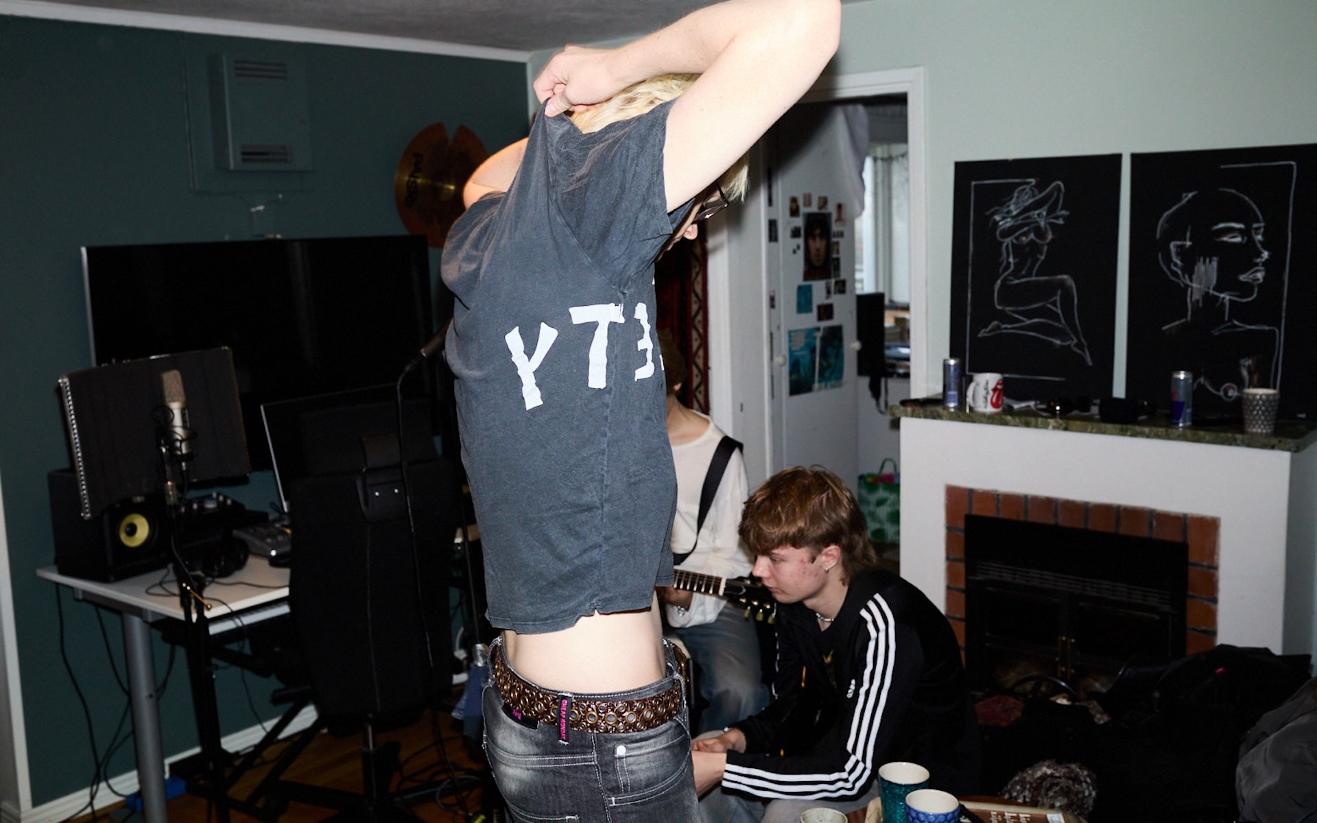 Music band Diset in their basement studio