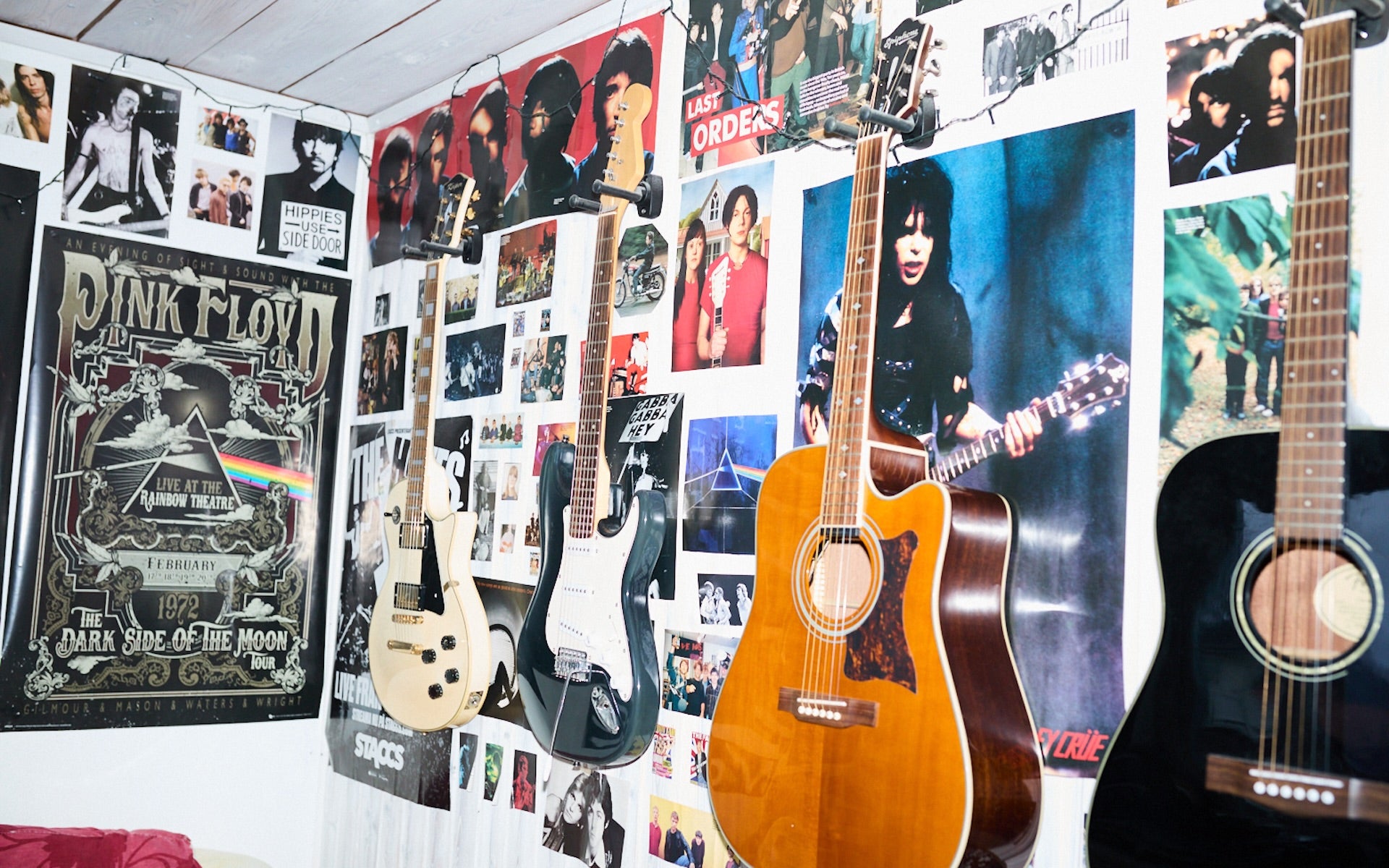 Wall of guitars and posters in Diset studio Stockholm