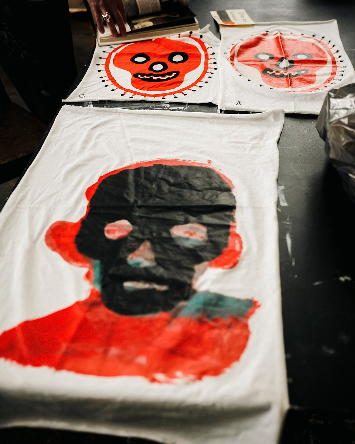 T-shirt with a graphic design of a face on a table