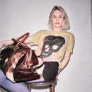 Person holding a Bum Society pony hair duffle bag Dandy Brown against a plain background color:dandy brown,earth