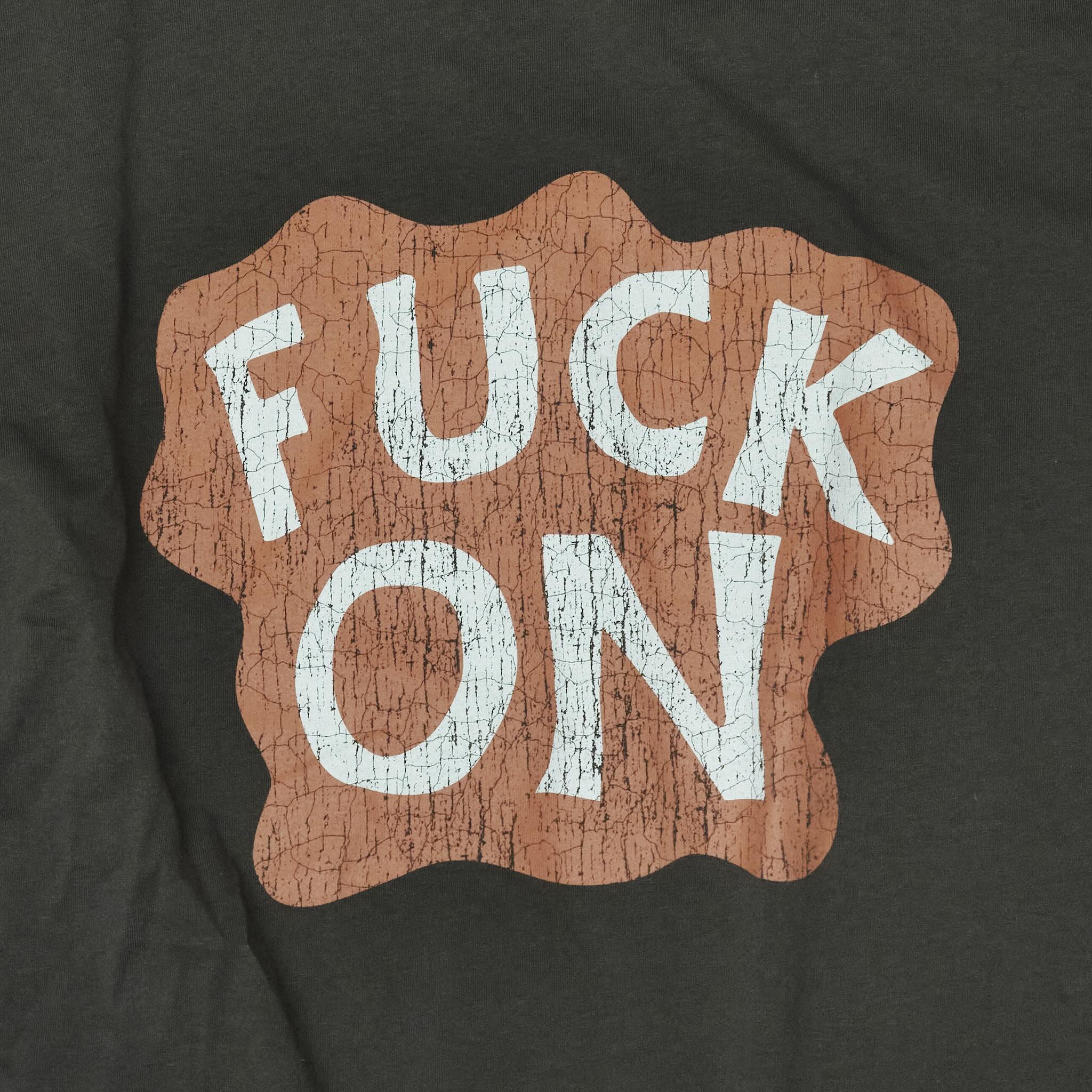 Close up cracked Fuck On print Bum Society t-shirt Ongoing color:ink