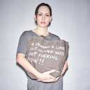 Person holding a Bum Society x Waldersten tote bag against a bright background color:ink