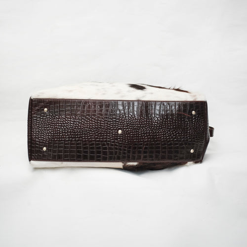 Bum Society pony hair duffle bag Dandy Brown bottom view color:dandy brown